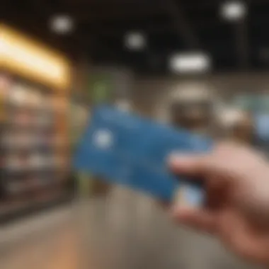 Credit card being used for a purchase at Ashley HomeStore