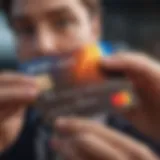 Close-up of a credit card with a person's hand holding it, symbolizing credit rebuilding.