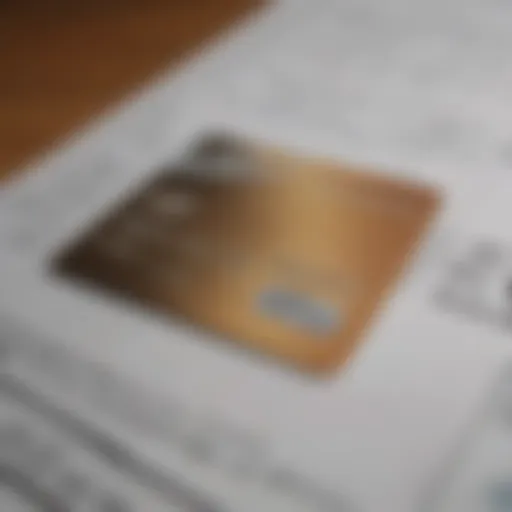 A close-up of a credit card against a backdrop of financial documents.