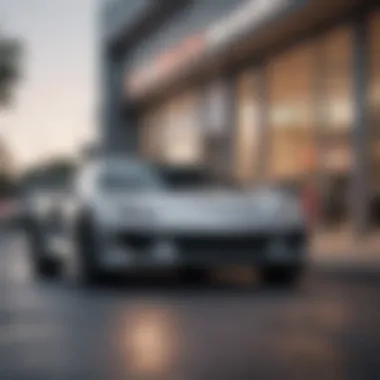 A sleek car parked in front of a dealership