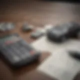 Calculator and car keys on a table, symbolizing financial planning for a vehicle purchase.